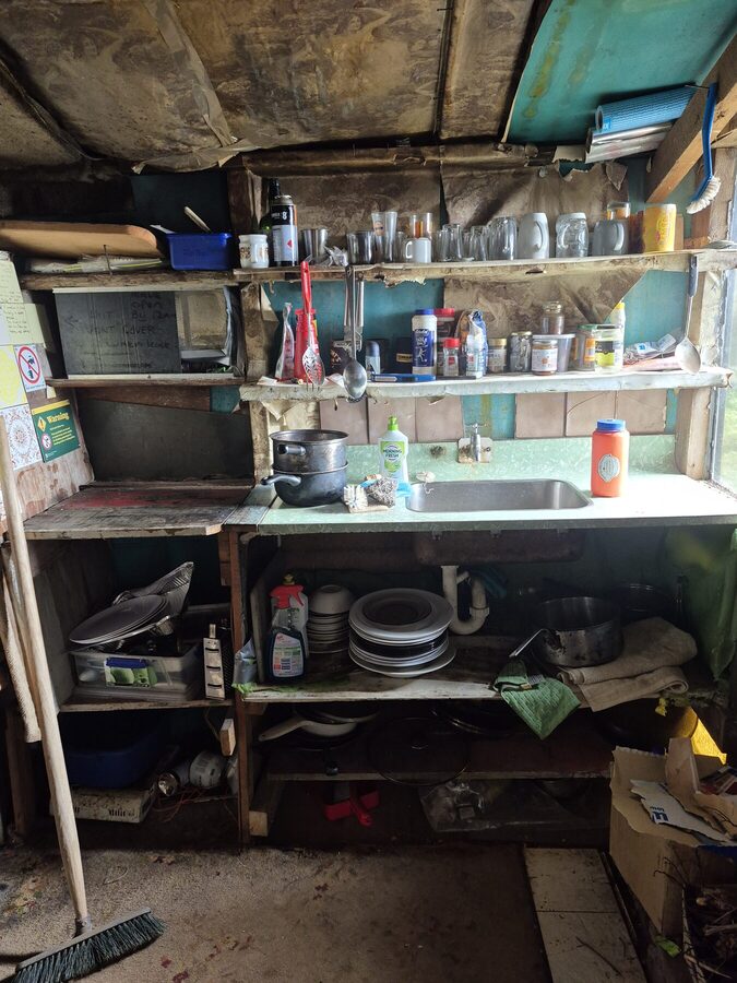 The hut's simple kitchen bench