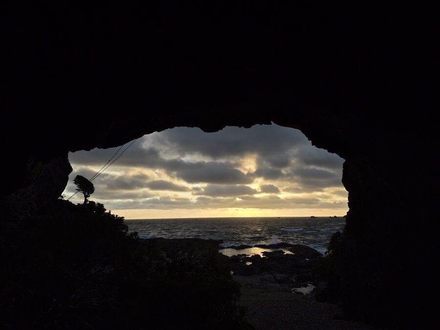 Sunset through the cave mouth